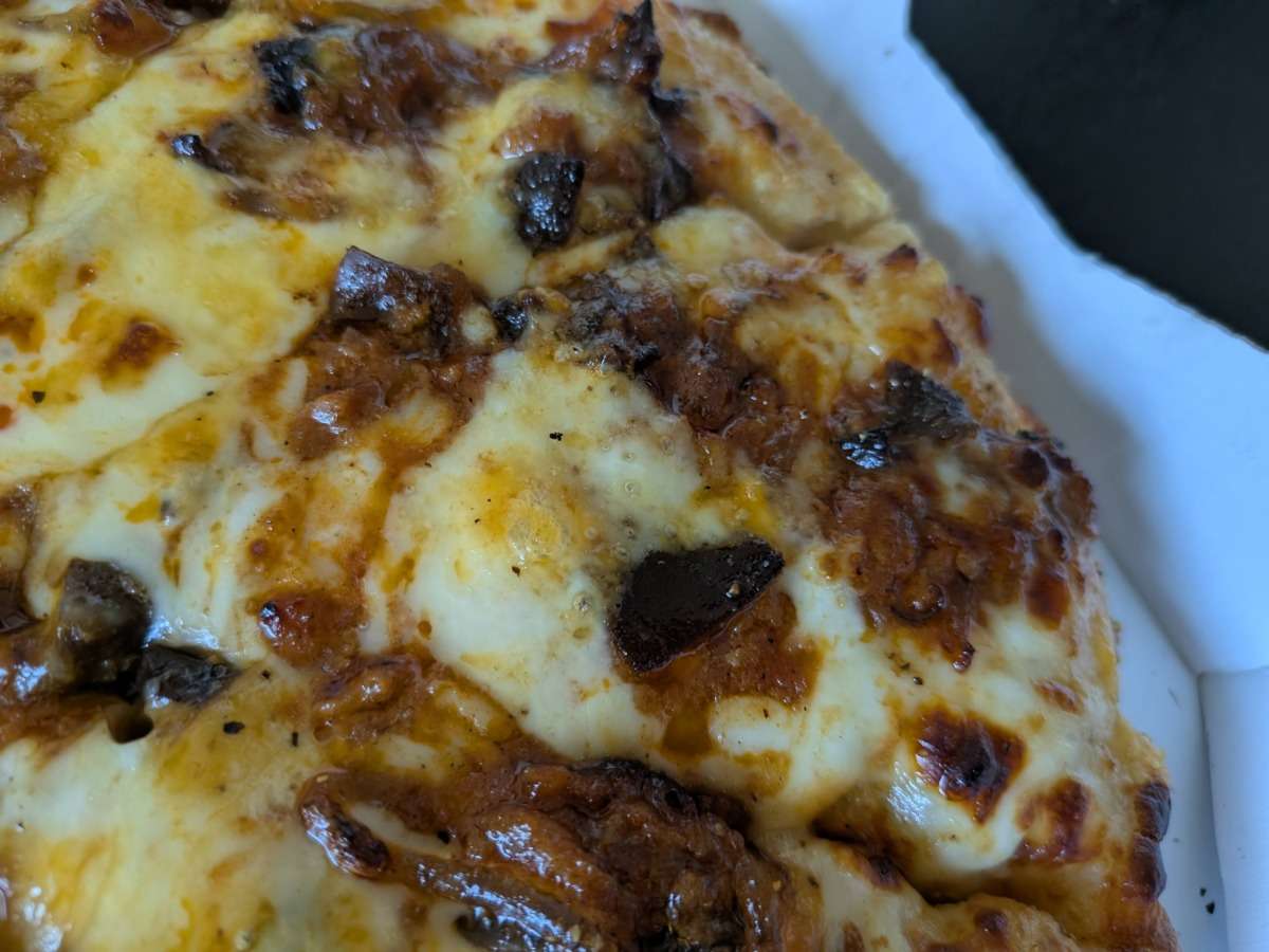 麻辣湯ピザのチーズ